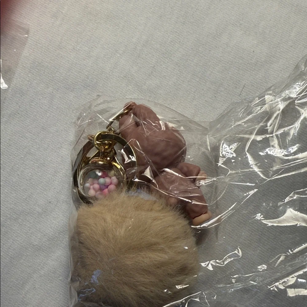 Cute Brown Animal Keychain with Pom Pom